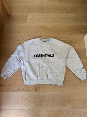 Essentials Light Grey Crewneck Sweatshirt with Black Logo